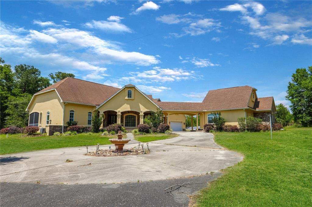Single Family Homes для того Продажа на 18604 NW 262ND AVENUE Alachua, Флорида 32615 Соединенные Штаты