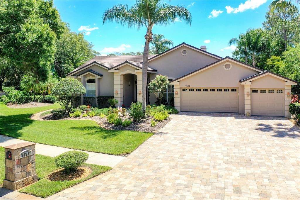 Single Family Homes pour l Vente à 1515 WHISPER WIND LANE Oldsmar, Floride 34677 États-Unis