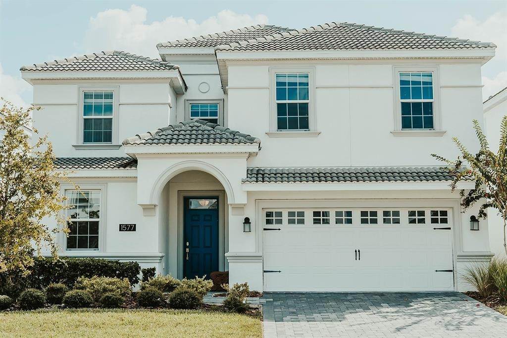 Single Family Homes pour l Vente à 1577 PLUNKER DRIVE Champions Gate, Floride 33896 États-Unis