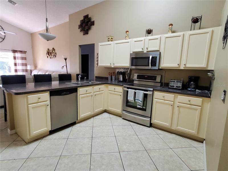 4. Single Family Homes for Sale at 1080 LAKE BERKLEY DRIVE Kissimmee, Florida 34746 United States