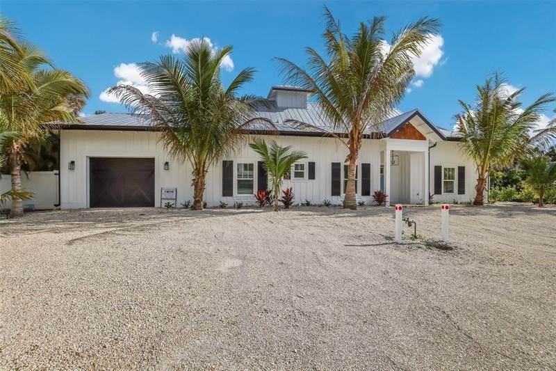 3. Single Family Homes for Sale at 305 73RD STREET Holmes Beach, Florida 34217 United States