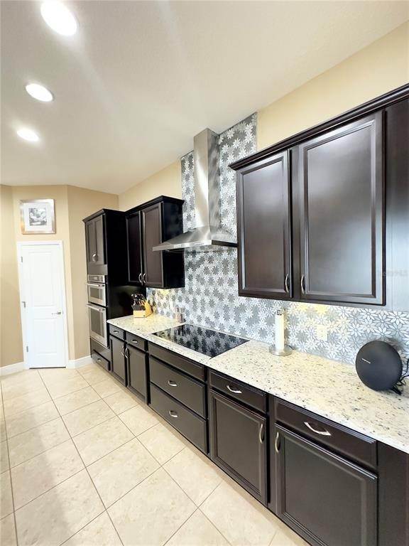 16. Single Family Homes for Sale at 9207 BUSACO PARK WAY Winter Garden, Florida 34787 United States