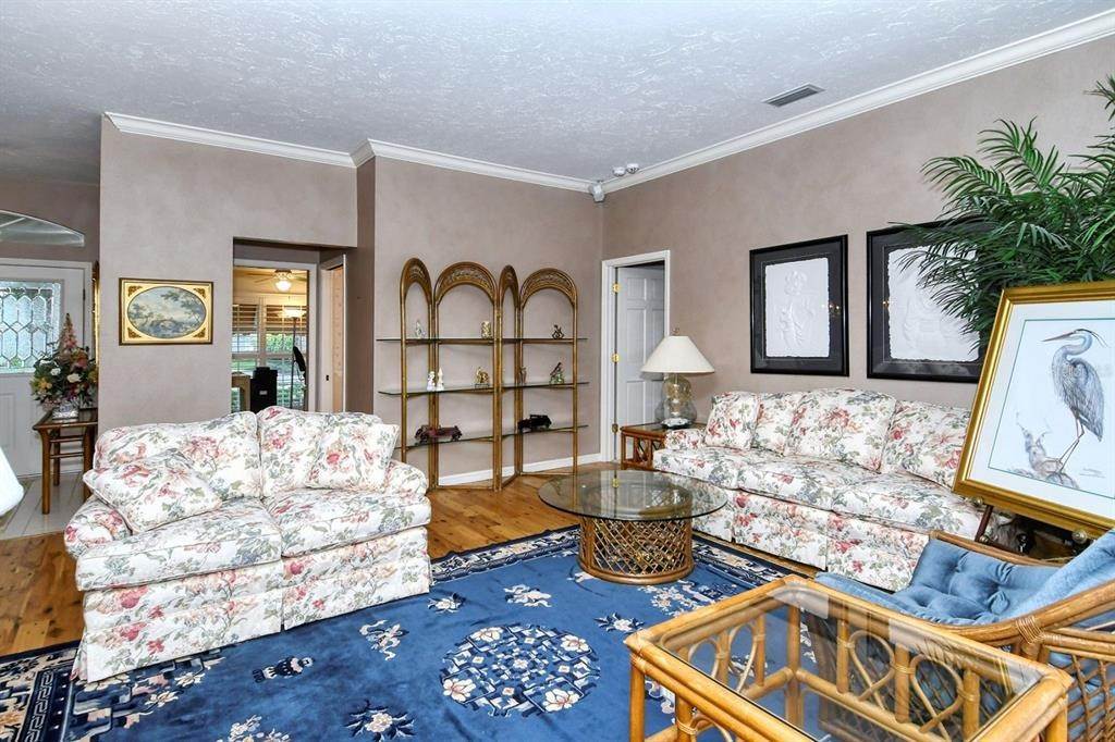 19. Single Family Homes for Sale at 7812 BROADMOOR PINES BOULEVARD Sarasota, Florida 34243 United States