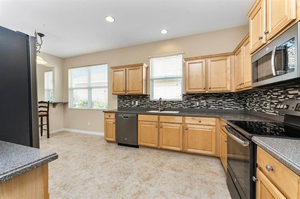 12. Single Family Homes for Sale at 11631 Dancing River Drive Venice, Florida 34292 United States